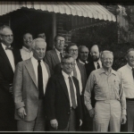 Group photo from a conference organized by the Miller Center (based at the University of Virginia, Charlottesville) held in Plains, Georgia, c. 1980.  Front row (left to right): Ken Thompson, Richard Neustadt, Jimmy Carter, and James Sterling Young. Back row: first four unknown, Richard Fenno, David Truman, Charles Jones.